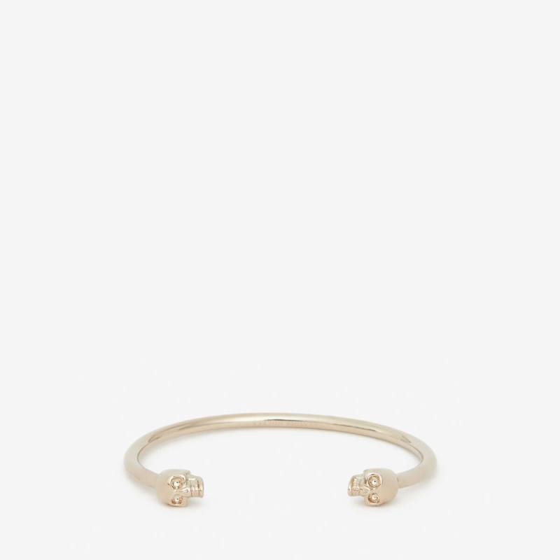 Alexander McQueen Women's Gold Twin skull bracelet - M (Brass)